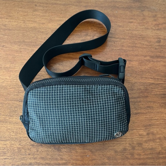 lululemon athletica Handbags - Original Lululemon Black Grid Everywhere Belt Bag 1L